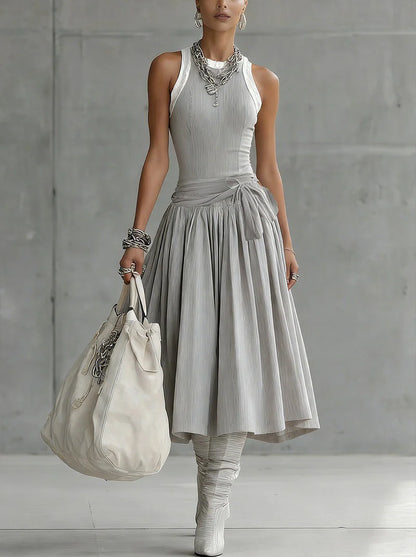 Completo a coste grigio — Top modellante e gonna midi drappeggiata