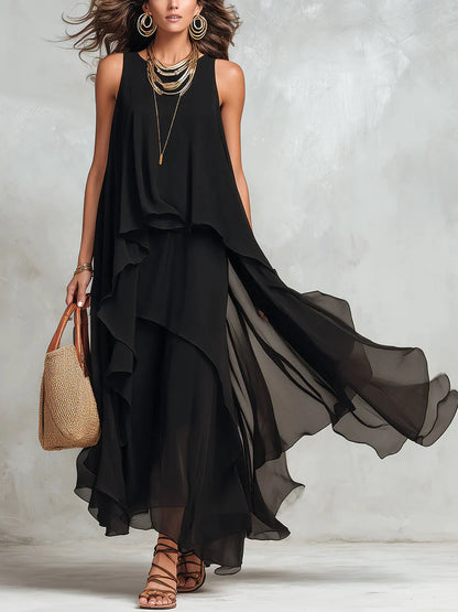Maxi abito nero in chiffon a strati, senza maniche e con scollo rotondo